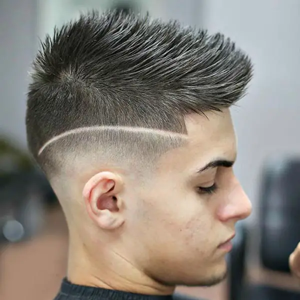 Mohawk with Slashed Signature Fade haircut