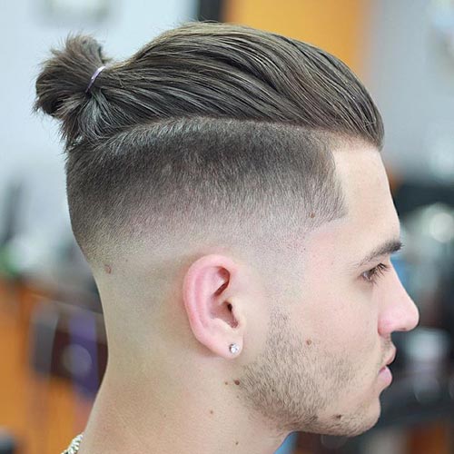 Man Bun with Low Skin Fade haircut