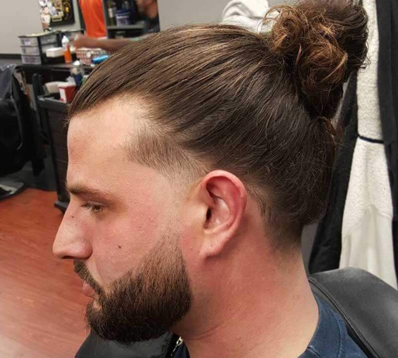 Man-bun taper hairstyle