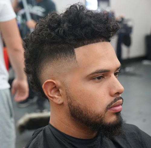 Curly Skin Fade Mohawk Haircut