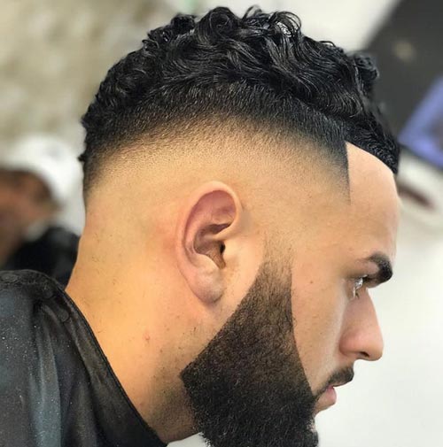 Curly Top with Skin Undercut Fade