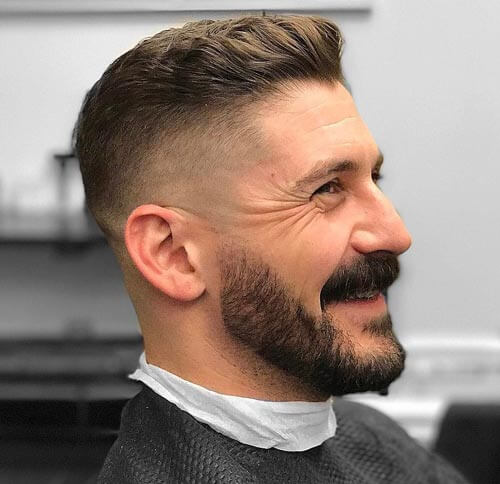 Wavy Swept Up Haircut with Undercut