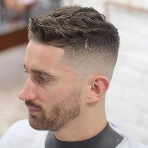 Wavy Brushed Up Haircut with Undercut