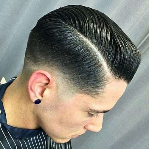 Sleeked Back Pompadour with Low Taper Fade