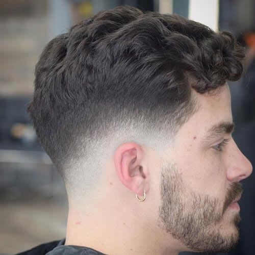 Low Fade Haircut with Wavy Fringe