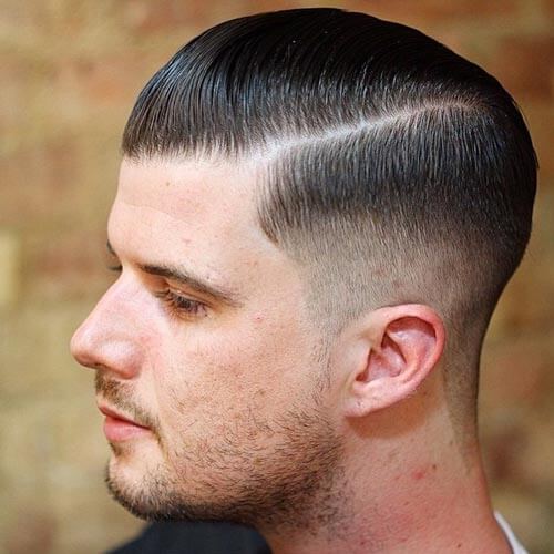 Side Slicked Haircut With Low Fade