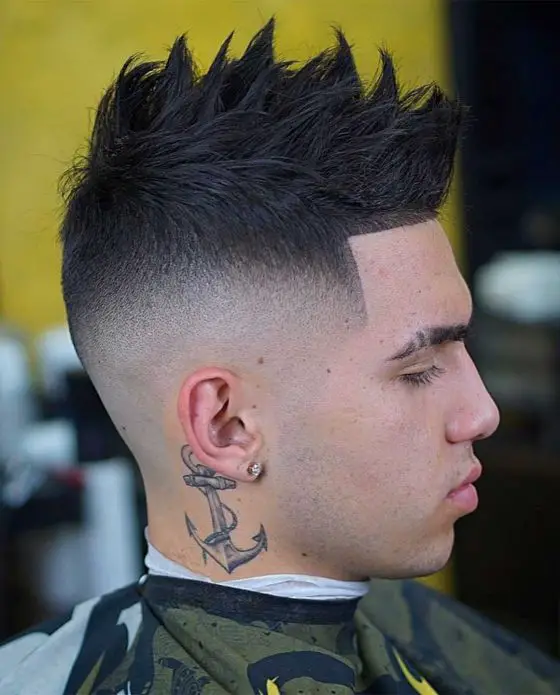 Long Top with Part-25 Best Faux Hawk Hairstyles (Fohawk) For Men In 2023