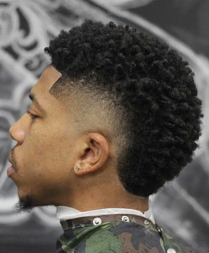 Burst Fade Mohawk for Men with Thick Curls