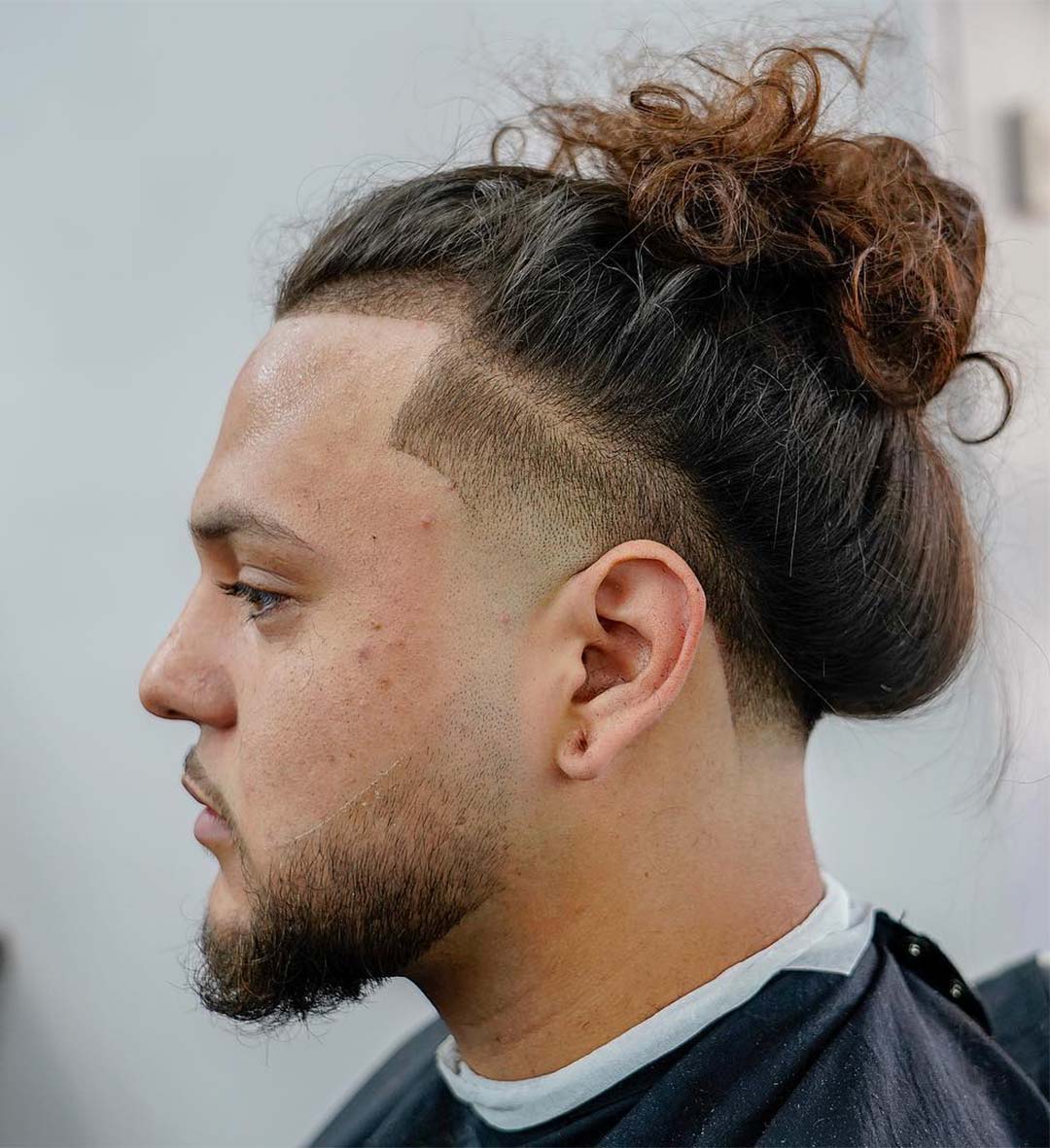 Man Bun + High Taper Fade