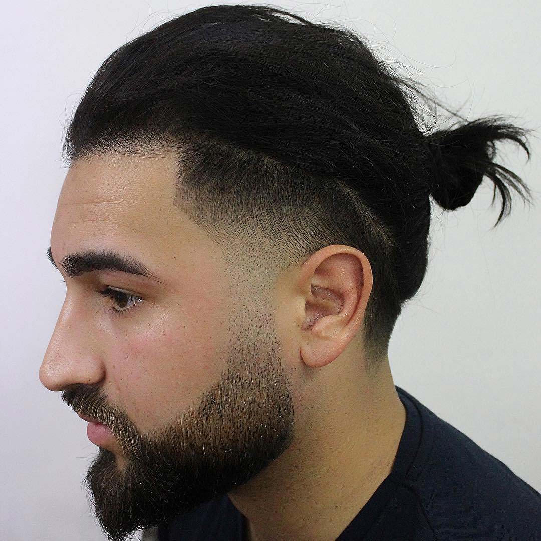 Top Knot with Mid Taper Fade