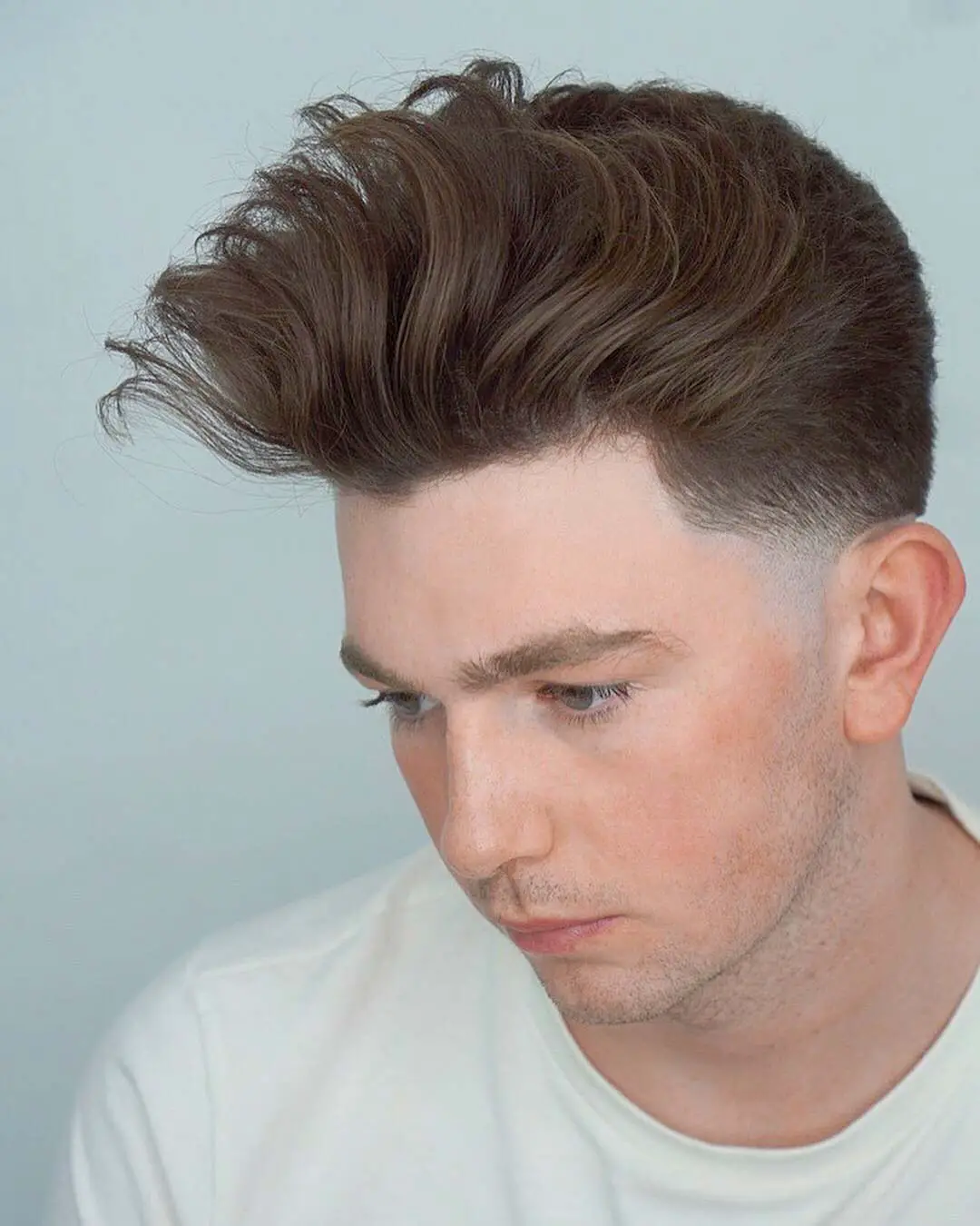 Voluminous Style with High Taper Fade